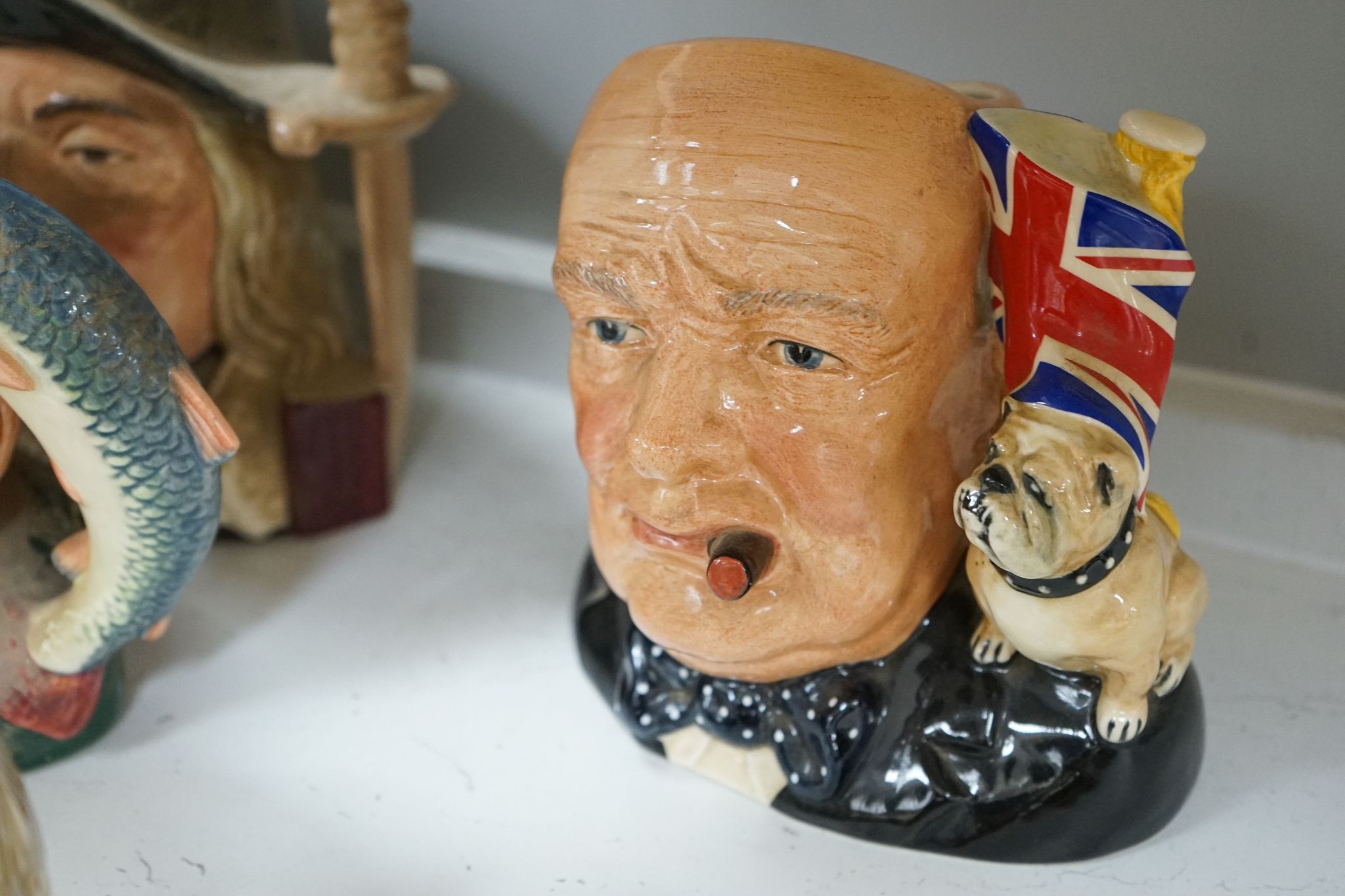 A collection of Royal Doulton character jugs, most boxed